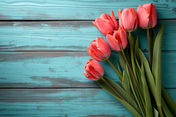 Bouquet of fresh beautiful delicate tulips on a wooden background as a gift, photo in light pastel colors, concept of Mother's Day, Women's Day, spring background, rustic style, copy space