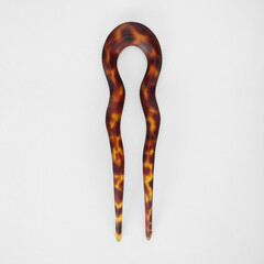 Woman hair accessories.  Hair claw clip isolated on white background. Trendy hairstyle. Trendy accessory. Fashionable accessory. Plastic claw clip.  