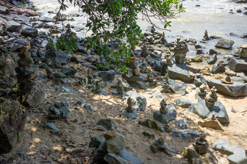 A stack of stones piled up on the beach in Balneario Camboriú, Brazil