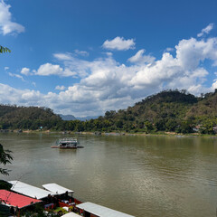 Fototapeta na wymiar Boat on the lake in Luang Prabang Province, Laos PDR.