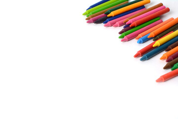 Crayons lined up isolated on white background.