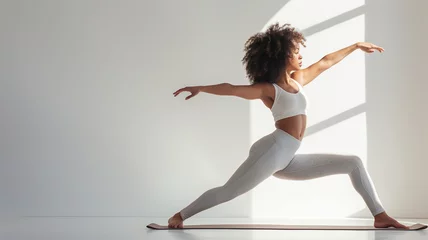 Foto op Canvas Woman doing yoga.  Working out, wearing sportswear bra and pants, full length © Katynn