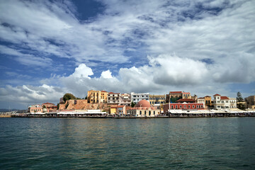 Taverns, historic buildings and crowds of tourists in the port of Chania on the island of Crete