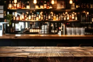 Foto op Plexiglas Bar table interior in pub with wooden counter background desk space blurred light for drink design cafe top in coffee restaurant vintage retro style wine shop brown alcohol abstract blurry kitchen © Thares2020