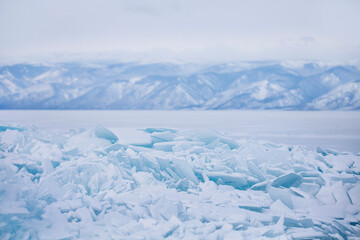 Turquoise ice floe. Ice-drift of Baikal lake, Winter landscape.