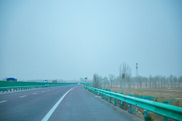 Pingliang City, Gansu Province - Road and field scenery under the blue sky