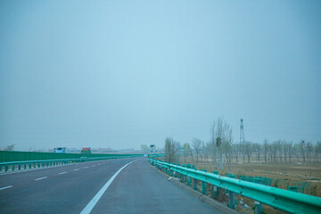Pingliang City, Gansu Province - Road and field scenery under the blue sky
