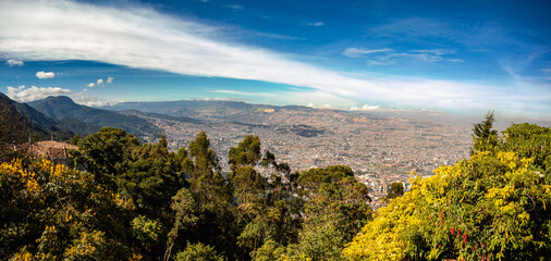Cityscape of Bogota, view from Cerro Monserrate hill. Distrito Capital abbreviated Bogota, D.C....
