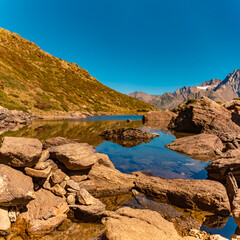 Fototapeta na wymiar High resolution stitched alpine summer panorama with reflections in Lake Seeles at the famous Kaunertal Glacier Road, Landeck, Tyrol, Austria