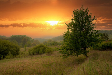 Fototapeta na wymiar hot sunset in valley