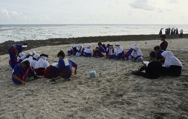 Junior High School Students in Cipatujah Beach