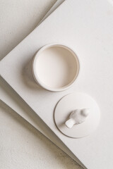 White box for small items in the interior of a white room