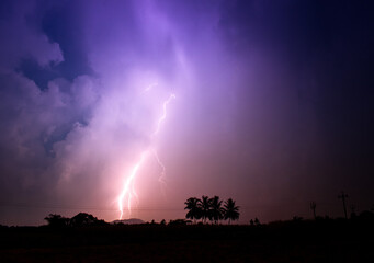  Brace yourself for an electrifying spectacle as a magnificent lightning storm dances above a...