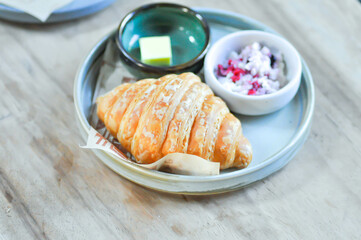 croissant , French croissant or French bread with butter and dip