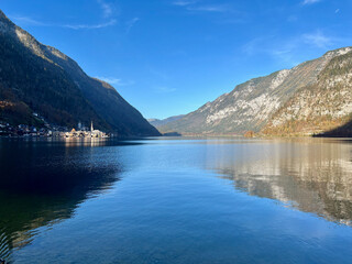 The famous village of Hallstatt across the lake, viewed from the Hallstatt Skywalk island, Hallstatt, Austria.