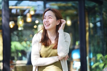 Fototapeta premium portrait of a smiling woman in cafe