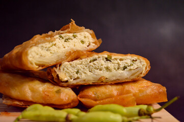 Martabak Tahu or  Tofu Martabak which is filled with chopped vegetables, spring onions, tofu and eggs. Indonesian traditional food.