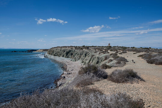 Rocky coastline and lighthouse in the Tabarca Island, municipality of Alicante, Spain