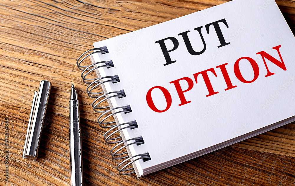 Aufkleber put option text on notebook with pen on wooden background