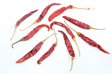 Dried red chili peppers, spices,peper, paprika on white background.