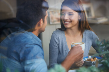 Relax woman, happy and couple on coffee shop date, lunch break or enjoy diner conversation, chat or eye contact. Relationship partner, restaurant window and girlfriend talking with boyfriend in cafe - obrazy, fototapety, plakaty