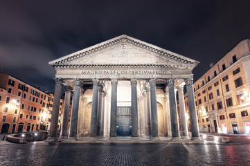 The empty Rotonda Square (Piazza della Rotonda) and illuminated ancient Pantheon in Rome in dark hours before sunrise, Italy