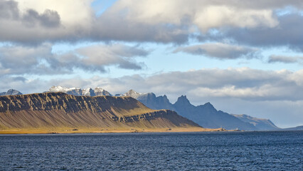 The dramatic coastline of Iceland displaying jagged peaks, eroding cliff sides and raw beauty.