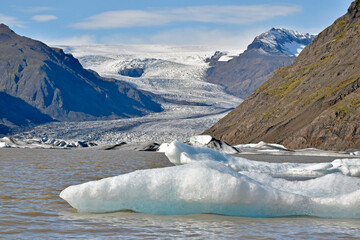 Icebergs float in a lake created by melting Vatnajokull glacier, Iceland