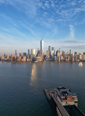 view of downtown manhattan skyline in new york city (seen from jersey city waterfront on hudson...
