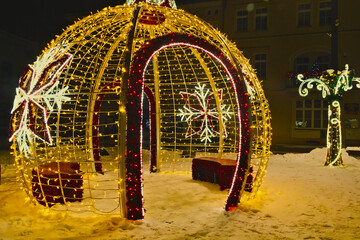 Glowing bauble - Christmas illumination on the market square in Lubliniec. Christmas 2023.