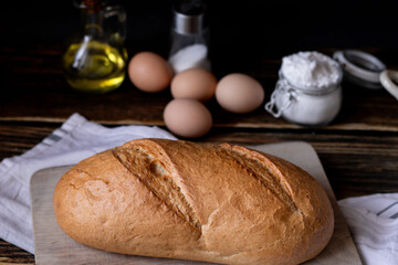 Bread. sliced ​​bread on a wooden background. food