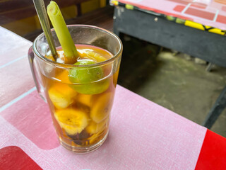Wedang Gedang is typical authentic traditional drinks from slopes of Mount Merapi, Sleman, Yogyakarta. This drink contains palm sugar syrup, sliced banana, lemon grass, cinnamon and ginger.