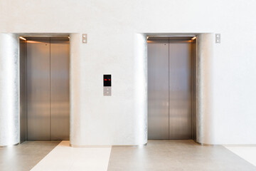 Modern Elevator doors in office building,Elevators in the modern lobby house or hotel,elevators in shopping mall.