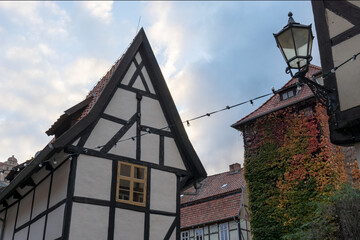 Historic half-timbered house and gable with autumn leaves in Quedlinburg, Saxony-Anhalt, Germany
