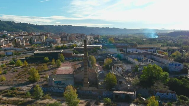 Abandoned industrial area with a big old chimney, Olesa de Montserrat