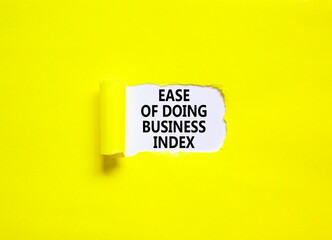 Ease of doing business index symbol. Concept words Ease of doing business index on beautiful white paper. Beautiful yellow paper background. Business, ease of doing business index concept. Copy space.