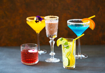 Different cold refreshing cocktails on the table