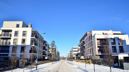 Residential area with modern, new and stylish living blocks of flats in winter time. 