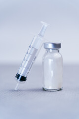 Simple composition of syringe with antibiotic bottle creating space for possible copy space or...