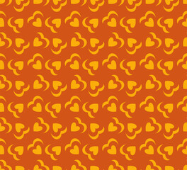 Retro 70's love heart seamless vector pattern. Yellow, orange heart shapes background. Funky, groovy seventies style design. Repeat backdrop wallpaper texture print.