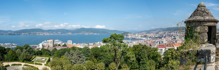 View towards the harbour and estuary of Vigo in Spain from the historic castle on Monte do Castro - obrazy, fototapety, plakaty