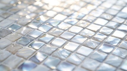  a close up view of a glass mosaic tile with light reflecting off of it's backgrouds.