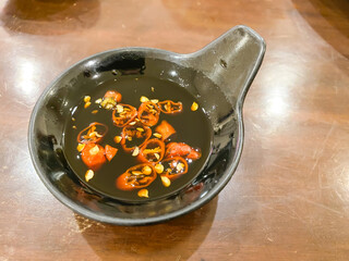Sambal Kecap or Chili Sauce mixed with sweet thick soy sauce that usually served with other main...