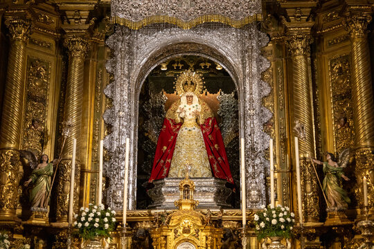 Seville, Andalusia, Spain - January 2 2024: statue of the Virgin of Hope of the Macarena (Virgen de la Esperanza Macarena). Cathedral of the Macarena. Seville