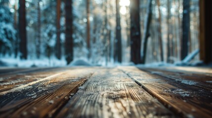 Naklejka na ściany i meble Old wooden table place of snow and snowy forest background, generative ai