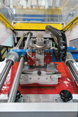 Industrial screen printing machine with red ink