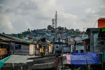 Hillside Slum Area with Colorful Houses and Antenna
