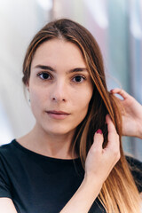 Fototapeta premium beautiful girl with long hair in a black T-shirt