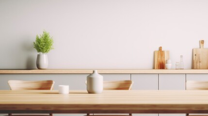 Empty dinning table with blurred kitchen background