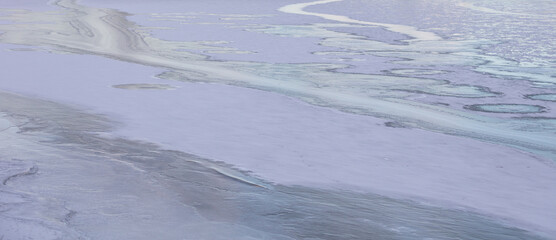 Fototapeta premium Ice patterns on a frozen lake